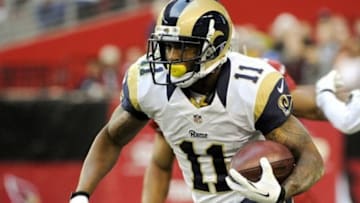Dec 8, 2013; Phoenix, AZ, USA; St. Louis Rams wide receiver Tavon Austin (11) runs the ball during the third quarter against the Arizona Cardinals at University of Phoenix Stadium. The Cardinals defeated the rams 30-10. Mandatory Credit: Casey Sapio-USA TODAY Sports