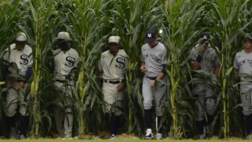 DYERSVILLE, IA - AUGUST 12: Players from the Chicago White Sox and New York Yankees walk though the corn rows while being introduced prior to the game on August 12, 2021 at Field of Dreams in Dyersville, Iowa. (Photo by Ron Vesely/Getty Images)