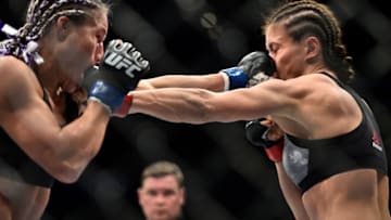 BROOKLYN, NEW YORK - APRIL 07: (L-R) Felice Herrig and Karolina Kowalkiewicz of Poland trade punches in their women's strawweight bout during the UFC 223 event inside Barclays Center on April 7, 2018 in Brooklyn, New York. (Photo by Brandon Magnus/Zuffa LLC/Zuffa LLC via Getty Images)