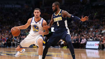 DENVER, CO - NOVEMBER 04: Klay Thompson #11 of the Golden State Warriors drives to the basket against Will Barton #5 of the Denver Nugget at the Pepsi Center on November 4, 2017 in Denver, Colorado. NOTE TO USER: User expressly acknowledges and agrees that, by downloading and or using this photograph, User is consenting to the terms and conditions of the Getty Images License Agreement. (Photo by Matthew Stockman/Getty Images)
