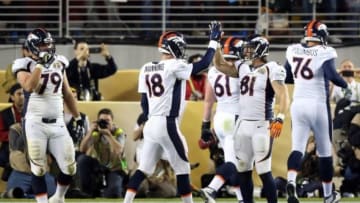 Feb 7, 2016; Santa Clara, CA, USA; Denver Broncos quarterback Peyton Manning (18) celebrates with tight end Owen Daniels (81) after a touchdown during the fourth quarter against the Carolina Panthers in Super Bowl 50 at Levi
