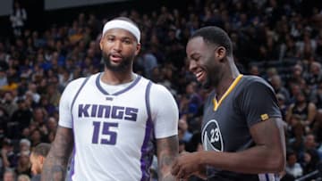 SACRAMENTO, CA - FEBRUARY 4: DeMarcus Cousins #15 of the Sacramento Kings faces off against Draymond Green #23 of the Golden State Warriors on February 4, 2017 at Golden 1 Center in Sacramento, California. NOTE TO USER: User expressly acknowledges and agrees that, by downloading and or using this photograph, User is consenting to the terms and conditions of the Getty Images Agreement. Mandatory Copyright Notice: Copyright 2017 NBAE (Photo by Rocky Widner/NBAE via Getty Images)
