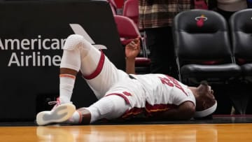 Miami Heat forward Jimmy Butler lays on the court after an apparent injury during the first half against the Memphis Grizzlies(Jasen Vinlove-USA TODAY Sports)