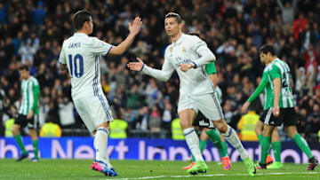 MADRID, SPAIN - MARCH 12: Cristiano Ronaldo of Real Madrid celebrates with James Rodriguez after scoring Real's opening goal during the La Liga match between Real Madrid CF and Real Betis Balompie at Estadio Santiago Bernabeu on March 12, 2017 in Madrid, Spain. (Photo by Denis Doyle/Getty Images)
