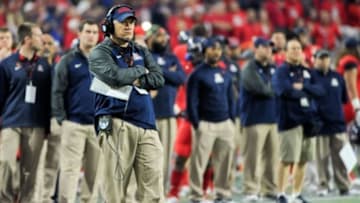 Dec 31, 2014; Glendale, AZ, USA; Arizona Wildcats defensive coordinator Jeff Casteel watches from the sideline during the second quarter against the Boise State Broncos in the 2014 Fiesta Bowl at Phoenix Stadium. The Broncos won 38-30. Mandatory Credit: Casey Sapio-USA TODAY Sports