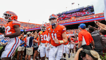 GAINESVILLE, FLORIDA - SEPTEMBER 28: Kyle Trask #11 of the Florida Gators and teammates enter the field before the start of a game against the Towson Tigers at Ben Hill Griffin Stadium on September 28, 2019 in Gainesville, Florida. (Photo by James Gilbert/Getty Images)