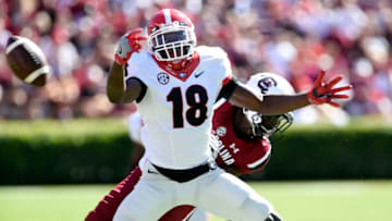 COLUMBIA, SC - OCTOBER 9: Defensive back Deandre Baker #18 of the Georgia football Bulldogs breaks up a pass intended for wide receiver Tyler Simmons #3 of the South Carolina Gamecocks of the Georgia Bulldogs on October 9, 2016 at Williams-Brice Stadium in Columbia, South Carolina. (Photo by Todd Bennett/GettyImages)