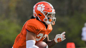 Clemson running back Chez Mellusi(27) runs during football practice in Clemson, S.C. Monday, March 22, 2021.Clemson Spring Football Practice