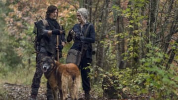 Norman Reedus as Daryl Dixon, Melissa McBride as Carol Peletier, Dog - The Walking Dead _ Season 10, Episode 18 - Photo Credit: Eli Ade/AMC