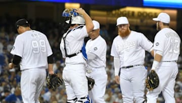 LOS ANGELES, CA - AUGUST 23: Hyun-Jin Ryu #99 of the Los Angeles Dodgers is taken out from the game after giving up a grand slam to Didi Gregorius #18 of the New York Yankees in the fifth inning at Dodger Stadium on August 23, 2019 in Los Angeles, California. Teams are wearing special color schemed uniforms with players choosing nicknames to display for Players' Weekend. (Photo by John McCoy/Getty Images)