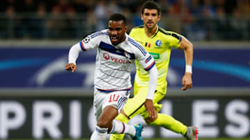 GENT, BELGIUM - SEPTEMBER 16: Alexandre Lacazette of Lyon battles for the ball with Stefan Mitrovic of Gent during the UEFA Champions League Group H match between KAA Gent and Olympique Lyonnais held at Ghelamco Arena on September 16, 2015 in Gent, Belgium. (Photo by Dean Mouhtaropoulos/Getty Images)