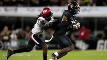 Cincinnati Bearcats cornerback Arquon Bush against UCF Knights at FBC Mortgage Stadium. The Enquirer.