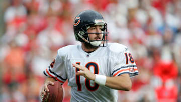 TAMPA, FL - NOVEMBER 27: Kyle Orton #18 of the Chicago Bears handles the ball against the Tampa Bay Buccaneers during their game on November 27, 2005 at Raymond James Stadium in Tampa, Florida. (Photo by Streeter Lecka/Getty Images)