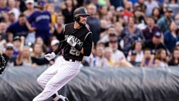 Aug 6, 2016; Denver, CO, USA; Colorado Rockies left fielder David Dahl (26) holds up at third after hitting a triple in the second inning against the Miami Marlins at Coors Field. Mandatory Credit: Isaiah J. Downing-USA TODAY Sports