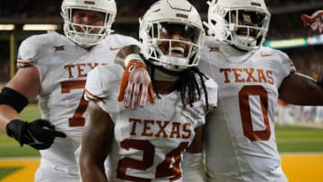 Sep 23, 2023; Waco, Texas, USA; Texas Longhorns running back Jonathon Brooks (24) celebrates with teammates after scoring a touchdown run against the Baylor Bears during the first half at McLane Stadium. Mandatory Credit: Chris Jones-USA TODAY Sports