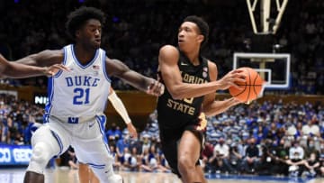Feb 19, 2022; Durham, North Carolina, USA; Florida State Seminoles guard Matthew Cleveland (35) drives to the basket as Duke Blue Devils forward AJ Griffin (21) defends during the first half at Cameron Indoor Stadium. Mandatory Credit: Rob Kinnan-USA TODAY Sports