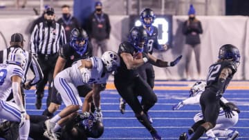 BOISE, ID - NOVEMBER 6: Running back Andrew Van Buren #21 of the Boise State Broncos breaks through the BYU Cougars' defensive line during first half action at Albertsons Stadium on November 6, 2020 in Boise, Idaho. (Photo by Loren Orr/Getty Images)