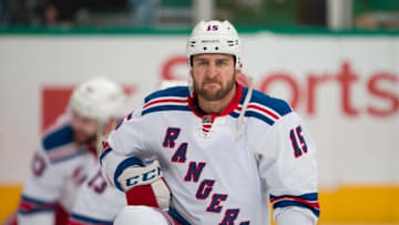 Feb 27, 2016; Dallas, TX, USA; New York Rangers left wing Tanner Glass (15) skates in warm-ups prior to the game against the Dallas Stars at the American Airlines Center. The Rangers defeat the Stars 3-2. Mandatory Credit: Jerome Miron-USA TODAY Sports