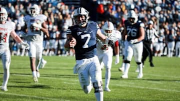 Nov 19, 2016; Provo, UT, USA; Brigham Young Cougars quarterback Taysom Hill (7) runs into the endzone and scores a touchdown against the Massachusetts Minutemen during the fourth quarter at Lavell Edwards Stadium. Brigham Young Cougars won the game 51-9. Mandatory Credit: Chris Nicoll-USA TODAY Sports