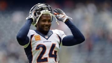 Dec 22, 2013; Houston, TX, USA; Denver Broncos cornerback Champ Bailey (24) warms up before the game against the Houston Texans at Reliant Stadium. Mandatory Credit: Thomas Campbell-USA TODAY Sports