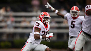 Christopher Smith of the Georgia Bulldogs runs with an interception against the Vanderbilt Commodores. (Photo by Brett Carlsen/Getty Images)