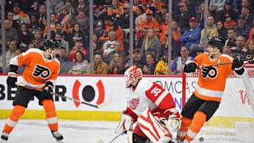 Mar 5, 2023; Philadelphia, Pennsylvania, USA; Philadelphia Flyers left wing Noah Cates (49) scores a goal past Detroit Red Wings goaltender Ville Husso (35) during the second period at Wells Fargo Center. Mandatory Credit: Eric Hartline-USA TODAY Sports