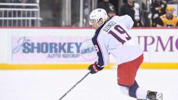 PITTSBURGH, PA - MARCH 07: Columbus Blue Jackets Left Wing Ryan Dzingel (19) skates with the puck during the first period in the NHL game between the Pittsburgh Penguins and the Columbus Blue Jackets on March 7, 2019, at PPG Paints Arena in Pittsburgh, PA. (Photo by Jeanine Leech/Icon Sportswire via Getty Images)