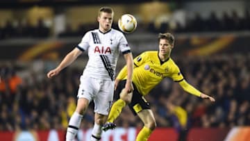 LONDON, ENGLAND - MARCH 17: Eric Dier of Tottenham Hotspur evades Julian Weigl of Borussia Dortmund during the UEFA Europa League round of 16, second leg match between Tottenham Hotspur and Borussia Dortmund at White Hart Lane on March 17, 2016 in London, England. (Photo by Laurence Griffiths/Getty Images)