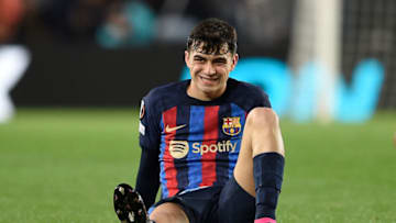 Pedri reacts after a fall during the match between FC Barcelona and Manchester United at the Camp Nou stadium in Barcelona, on February 16, 2023. (Photo by JOSEP LAGO/AFP via Getty Images)