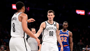 NEW YORK, NY - OCTOBER 03: Spencer Dinwiddie #8 and Rodions Kurucs #00 of the Brooklyn Nets celebrate the play against the New York Knicks during a preseason game at Barclays Center on October 3, 2018 in New York City. NOTE TO USER: User expressly acknowledges and agrees that, by downloading and or using this photograph, User is consenting to the terms and conditions of the Getty Images License Agreement. (Photo by Steven Ryan/Getty Images)