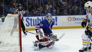 Mar 8, 2016; Buffalo, NY, USA; Buffalo Sabres left wing Johan Larsson (22) scores on New York Rangers goalie Antti Raanta (32) during the second period at First Niagara Center. Mandatory Credit: Kevin Hoffman-USA TODAY Sports