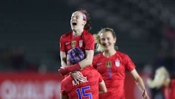 CARSON, CA - FEBRUARY 07: Rose Lavelle #16 of USA celebrates with her teammate Megan Rapinoe #15 after scoring her team's first goal during the semifinals game between Mexico and United States as part of the 2020 CONCACAF Women's Olympic Qualifying at Dignity Health Sports Park on February 7, 2020 in Carson, California. (Photo by Omar Vega/Getty Images)