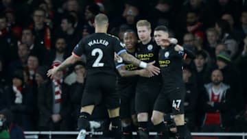 LONDON, ENGLAND - DECEMBER 15: Kevin De Bruyne of Manchester City celebrates after he scores a goal to make it 1-0 with team-mates Kyle Walker, Raheem Sterling and Phil Foden during the Premier League match between Arsenal FC and Manchester City at Emirates Stadium on December 15, 2019 in London, United Kingdom. (Photo by Robin Jones/Getty Images)