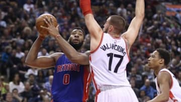 Jan 30, 2016; Toronto, Ontario, CAN; Detroit Pistons center Andre Drummond (0) goes up against Toronto Raptors center Jonas Valanciunas (17) at Air Canada Centre. The Raptors beat the Pistons 111-107. Mandatory Credit: Tom Szczerbowski-USA TODAY Sports
