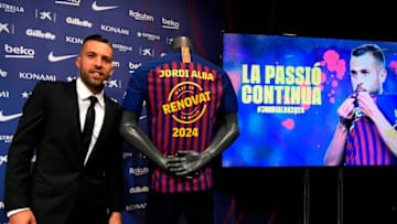 FC Barcelona's Spanish defender Jordi Alba poses during a press conference to officially announce his contract renewal at the Camp Nou stadium in Barcelona on March 11, 2019 (Photo by LLUIS GENE / AFP) (Photo credit should read LLUIS GENE/AFP/Getty Images)