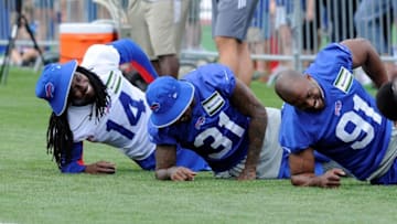 Jul 30, 2016; Pittsford, NY, USA; Buffalo Bills wide receiver Sammy Watkins (14) and defensive back Jonathan Dowling (31) and outside linebacker Manny Lawson (91) warm up during training camp at St. John Fisher College. Mandatory Credit: Mark Konezny-USA TODAY Sports