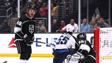 LOS ANGELES, CALIFORNIA - OCTOBER 27: Brendan Lemieux #48 of the Los Angeles Kings reacts to his roughing penalty on Mark Scheifele #55 of the Winnipeg Jets in front of Jonathan Quick #32, trailing 5-4 to the Jets during the third period in a 6-4 Jets win at Crypto.com Arena on October 27, 2022 in Los Angeles, California. (Photo by Harry How/Getty Images)