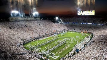 The Penn State football team runs out onto the field to take on Auburn in a White Out game at Beaver Stadium on Saturday, Sept. 18, 2021, in State College.Hes Dr 091821 Pennstate 23