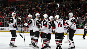 CHICAGO, IL - DECEMBER 08: The Arizona Coyotes celebrate after defeating the Chicago Blackhawks 4-3 at the United Center on December 8, 2019 in Chicago, Illinois. (Photo by Bill Smith/NHLI via Getty Images)
