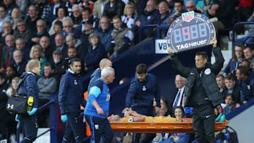 WEST BROMWICH, ENGLAND - OCTOBER 15: Mauricio Pochettino, Manager of Tottenham Hotspur pats Toby Alderweireld of Tottenham Hotspur on the chest after he is subbed off injured during the Premier League match between West Bromwich Albion and Tottenham Hotspur at The Hawthorns on October 15, 2016 in West Bromwich, England. (Photo by Richard Heathcote/Getty Images)