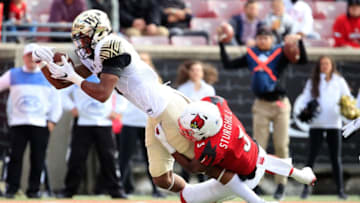 LOUISVILLE, KY - OCTOBER 27: Scotty Washington #7 of the Wake Forest Demon Deacons scores a touchdown against the Louisville Cardinals on October 27, 2018 in Louisville, Kentucky. (Photo by Andy Lyons/Getty Images)