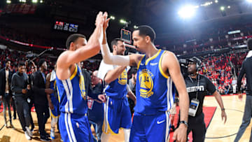 HOUSTON, TX - MAY 10: Stephen Curry #30 and Shaun Livingston #34 of the Golden State Warriors high five after Game Six of the Western Conference Semifinals against the Houston Rockets during the 2019 NBA Playoffs on May 10, 2019 at the Toyota Center in Houston, Texas. NOTE TO USER: User expressly acknowledges and agrees that, by downloading and/or using this photograph, user is consenting to the terms and conditions of the Getty Images License Agreement. Mandatory Copyright Notice: Copyright 2019 NBAE (Photo by Andrew D. Bernstein/NBAE via Getty Images)