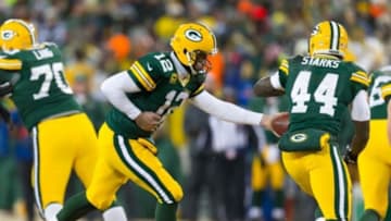 Jan 5, 2014; Green Bay, WI, USA; Green Bay Packers quarterback Aaron Rodgers (12) during the 2013 NFC wild card playoff football game against the San Francisco 49ersat Lambeau Field. San Francisco won 23-20. Mandatory Credit: Jeff Hanisch-USA TODAY Sports