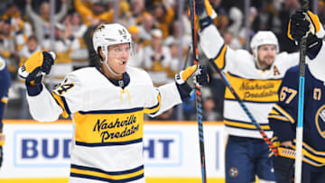 Jan 18, 2020; Nashville, Tennessee, USA; Nashville Predators center Mikael Granlund (64) celebrates after a goal by Nashville Predators right wing Craig Smith (not pictured) during the third period against the Buffalo Sabres at Bridgestone Arena. Mandatory Credit: Christopher Hanewinckel-USA TODAY Sports