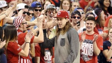 Feb 15, 2014; Spokane, WA, USA; Boston Celtics center Kelly Olynyk high fives the student section during a game against the Loyola Marymount Lions during the second half at McCarthey Athletic Center. The Bulldogs beat Lions 86-67. Mandatory Credit: James Snook-USA TODAY SportsImage 12 of 30