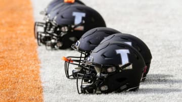CHAMPAIGN, IL - OCTOBER 13: Illinois Fighting Illini helmets sit on the sidelines as players warm up for the Big Ten Conference college football game between the Purdue Boilermakers and the Illinois Fighting Illini on October 13, 2018, at Memorial Stadium in Champaign, Illinois. (Photo by Michael Allio/Icon Sportswire via Getty Images)