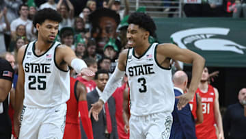 Feb 7, 2023; East Lansing, Michigan, USA; Michigan State Spartans forward Malik Hall (25) and guard Jaden Akins (3) celebrate a basket against the Maryland Terrapins in the second half at Jack Breslin Student Events Center. Mandatory Credit: Dale Young-USA TODAY Sports