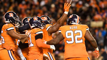 DENVER, CO - NOVEMBER 25: Shelby Harris (96) of the Denver Broncos holds the ball high as teammates swarm him upon intercepting a pass by Ben Roethlisberger (7) of the Pittsburgh Steelers in the end zone to clinch the game during the fourth quarter of the Broncos' 24-17 win on Sunday, November 25, 2018. The Denver Broncos hosted the Pittsburgh Steelers. (Photo by AAron Ontiveroz/The Denver Post via Getty Images)
