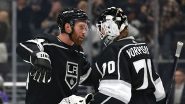 LOS ANGELES, CALIFORNIA - MARCH 04: Vladislav Gavrikov #84 and Joonas Korpisalo #70 of the Los Angeles Kings celebrate a 4-2 Kings win over the St. Louis Blues at Crypto.com Arena on March 04, 2023 in Los Angeles, California. (Photo by Harry How/Getty Images)