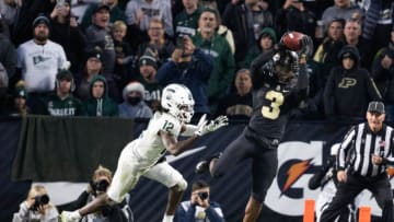 Nov 6, 2021; West Lafayette, Indiana, USA; Purdue Boilermakers wide receiver David Bell (3) runs the ball while Michigan State Spartans cornerback Chester Kimbrough (12) defends in the second half at Ross-Ade Stadium. Mandatory Credit: Trevor Ruszkowski-USA TODAY Sports